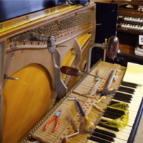 Destringing of a Steinway Z Piano